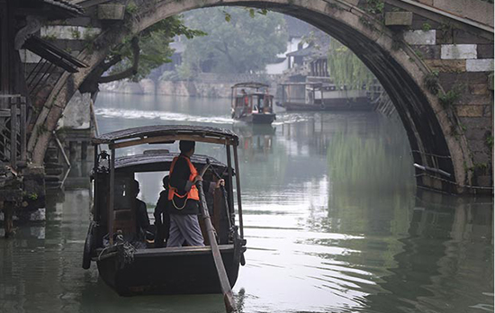 Wuzhen: Ancient town cruising on information superhighway