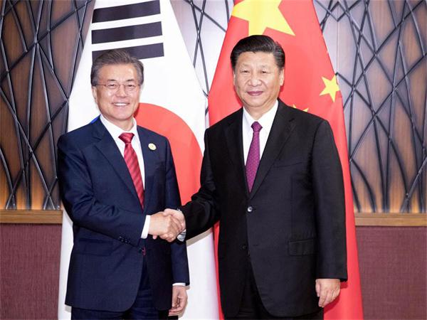 Moon's China visit key to peace amid tensions