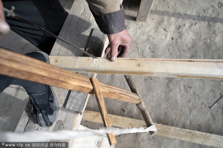 Making flour sifter now a craft of the past