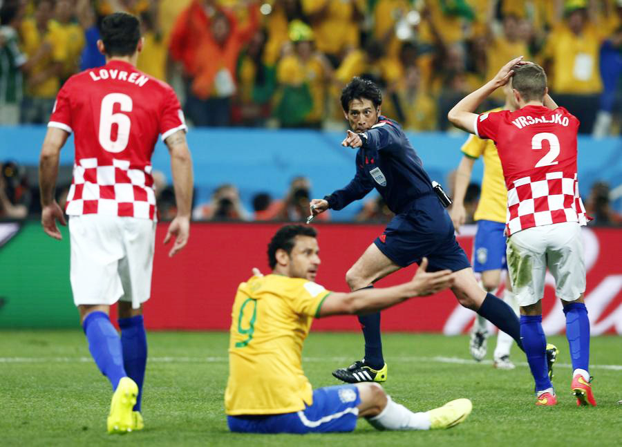 Brazil survives own-goal to win World Cup opener