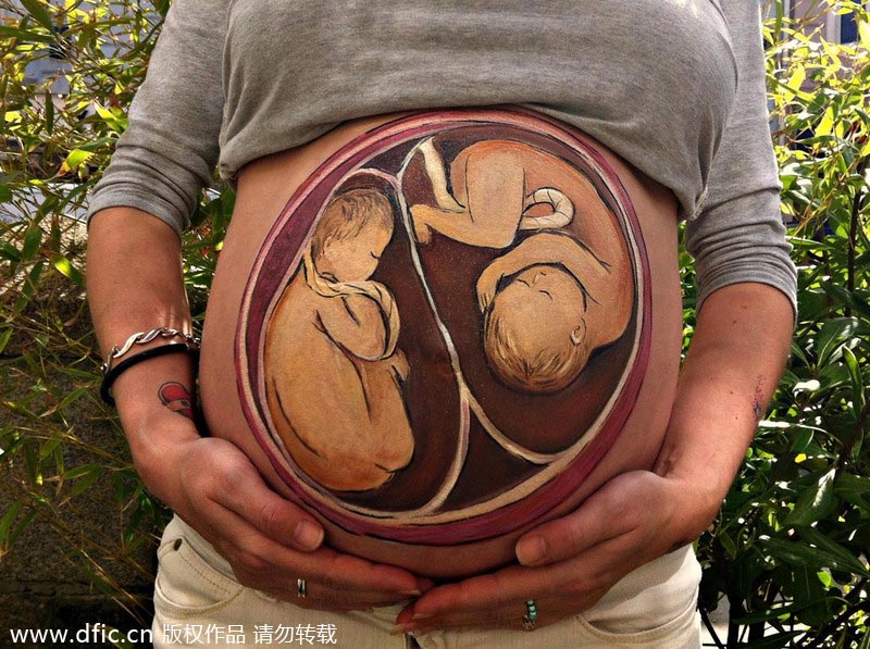 Baby bump paintings celebrate life
