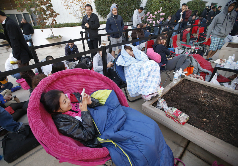 Apple fans line up around the world for iPhone 6