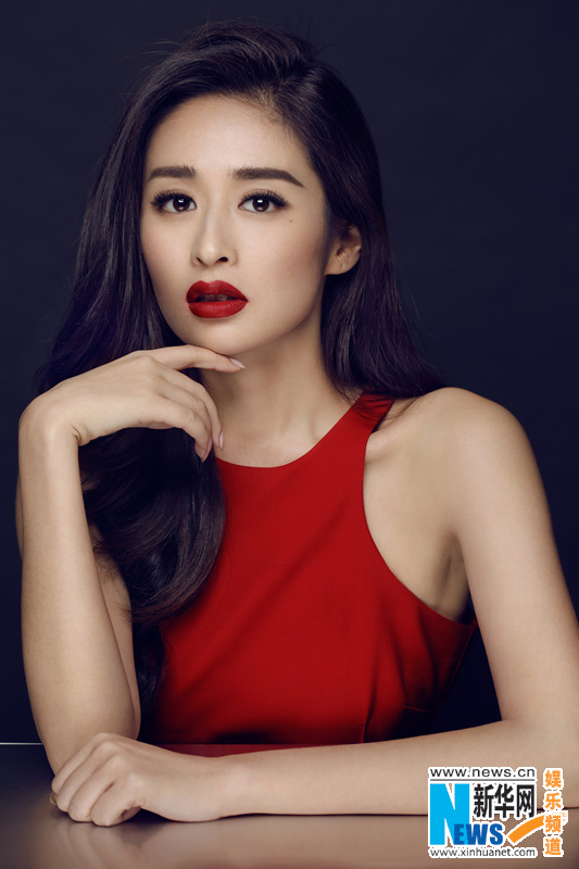 Actress Ying Er poses in red dress to welcome Year of the Monkey