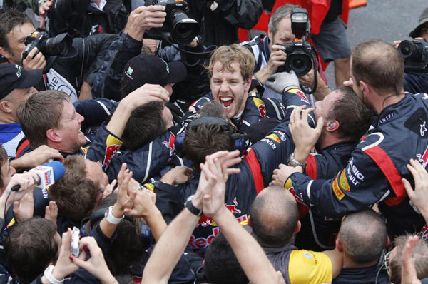 Yearender motor racing: Vettel takes triple in year of surprises