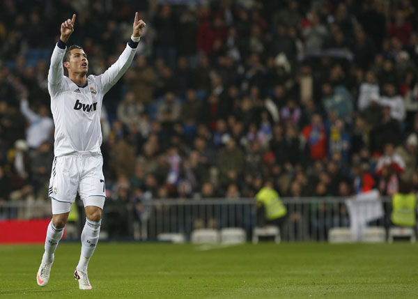 Ronaldo hat-trick fires Real into Cup quarters