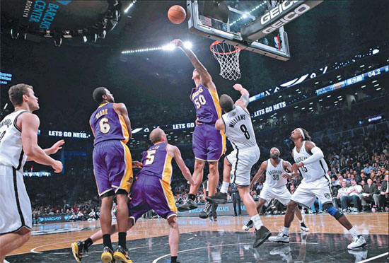 Short-handed Lakers beat Nets 92-83