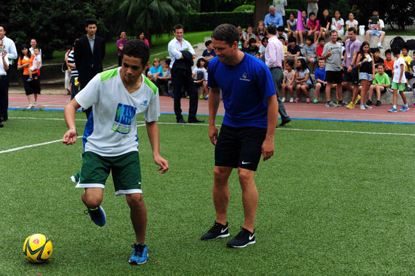 Michael Owen promotes soccer in China