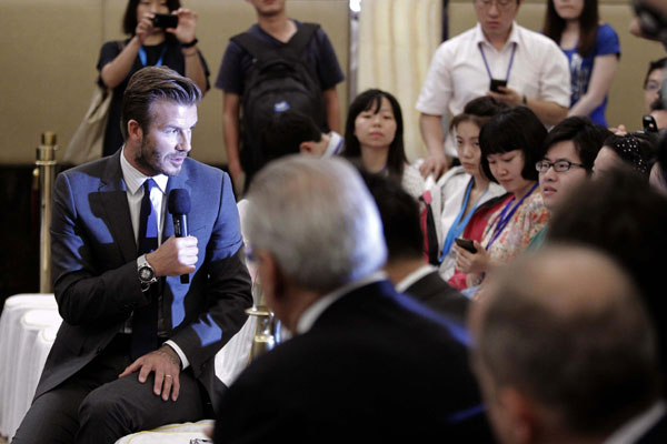 Beckham charms Shanghai as he continues China visit
