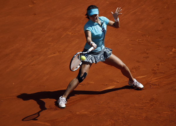 Li Na beats Zheng Jie to advance in Madrid Open