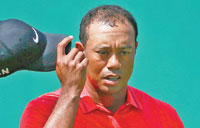 Woods' future uncertain with more back pain