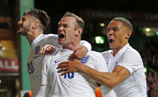 Rooney's double helps England floor Scotland
