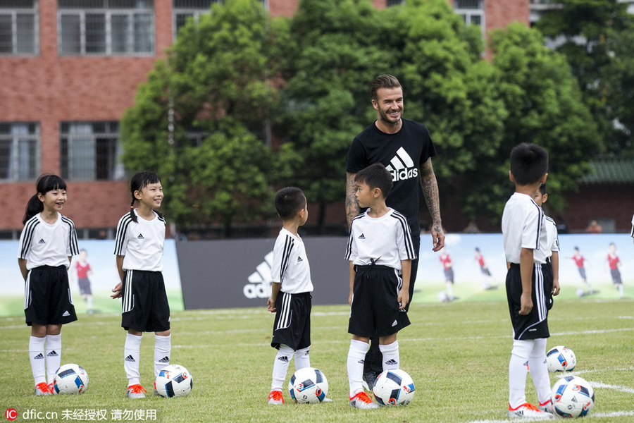 David Beckham promotes football in South China school