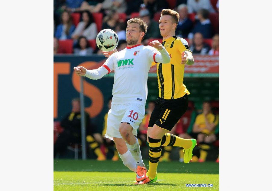 FC Augsburg draws 1-1 with Borussia Dortmund during Bundesliga match