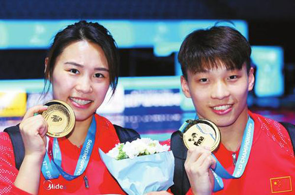 Team China showcases talents in mixed events at FINA Worlds