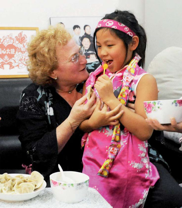 China leads way on US adoptions