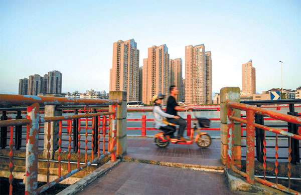 Rebalancing seen amid weak economic growth