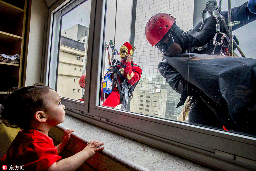 Superheroes cheer up sick children in Sao Paulo