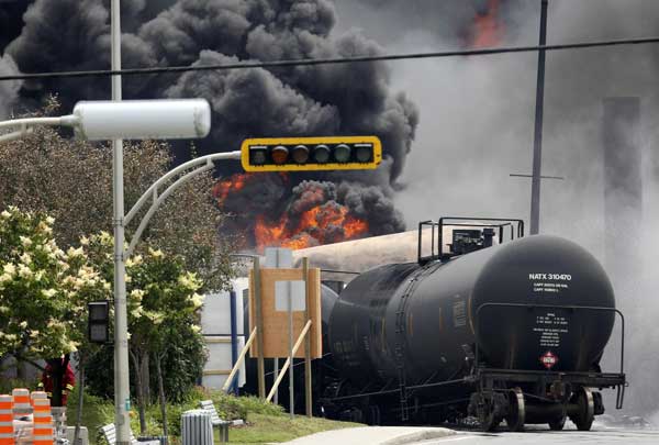 Derailed train explodes, levels center of Canada town