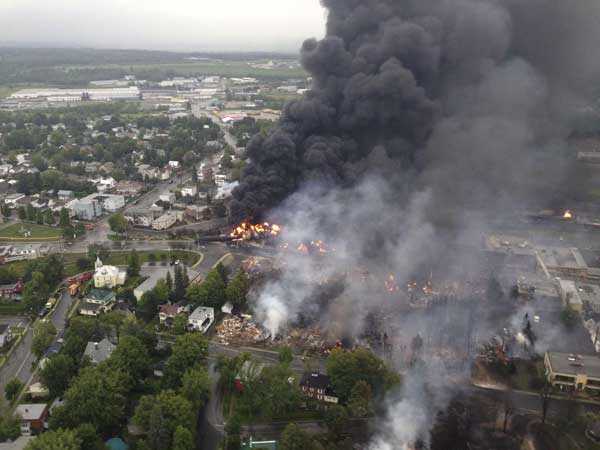Derailed train explodes, levels center of Canada town