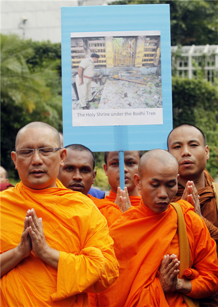Buddhist monks hold prayer after Bodh Gaya blasts