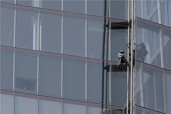 Environmental activists scale London's Shard tower