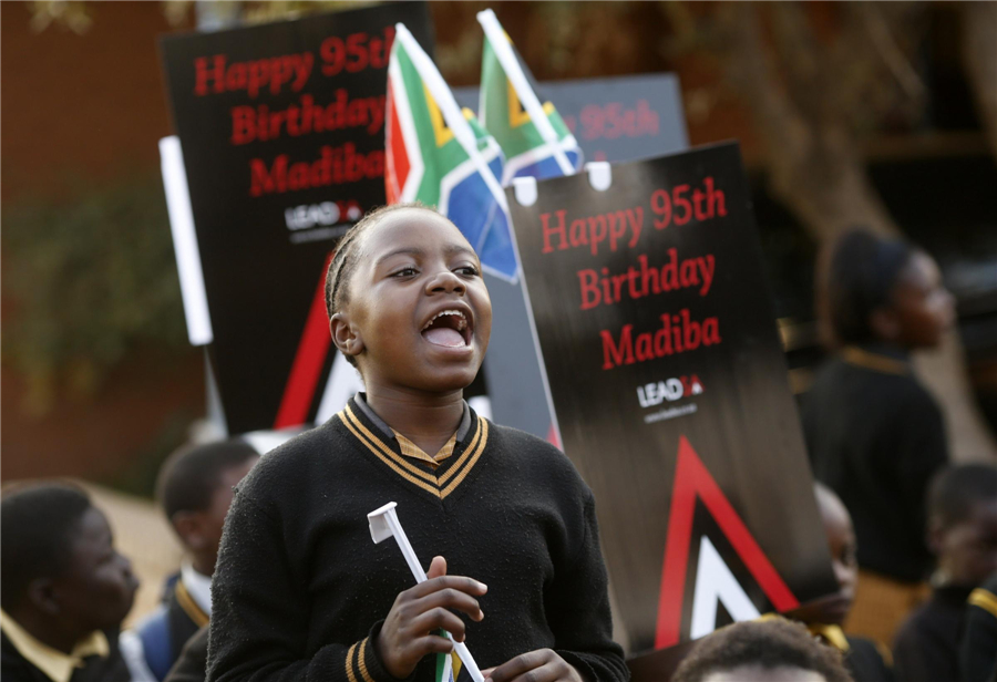 'Improving' Mandela marks 95th birthday