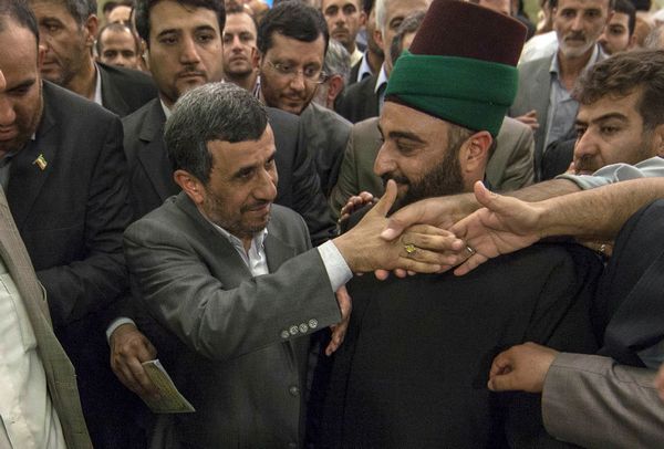 Ahmadinejad visits the holy shrine of Imam Abbas