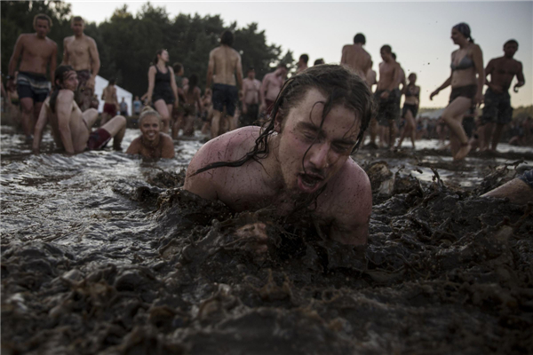 Woodstock revellers embrace music and mud