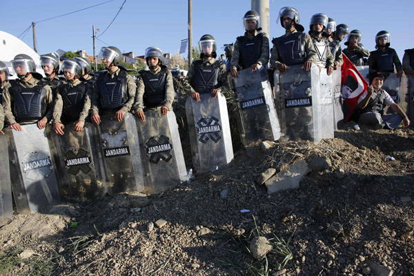 Turkish police clash with protesters over coup trial