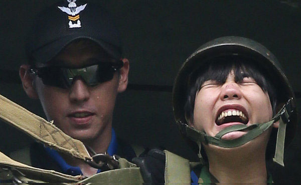 Faces of fun and fear at Korean boot camp