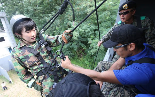 Faces of fun and fear at Korean boot camp