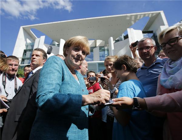 Merkel attends German govt's open day in Berlin