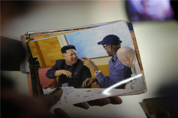 DPRK top leader meets visiting Rodman