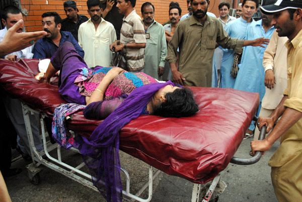 Twin suicide blasts kill 56 in Pakistan