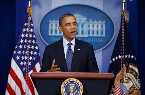 Obama says he'll negotiate once 'threats' end