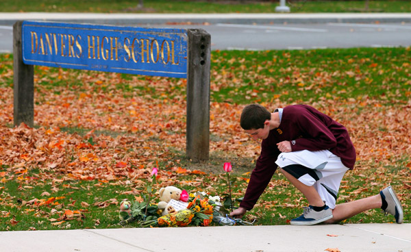 Mass. teacher slain; 14-year-old student charged