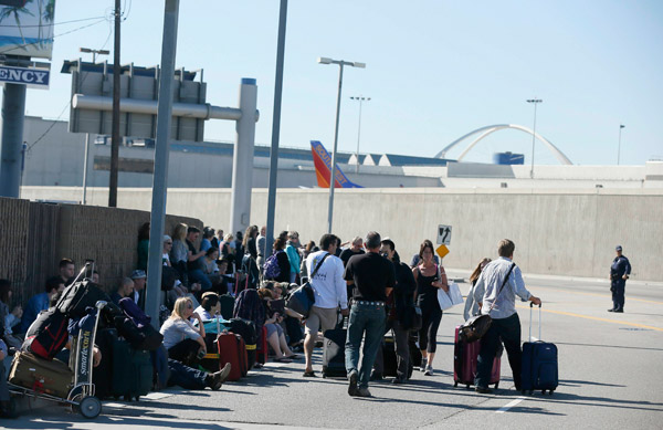 Multiple victims in shooting at L.A. airport; suspected gunman held