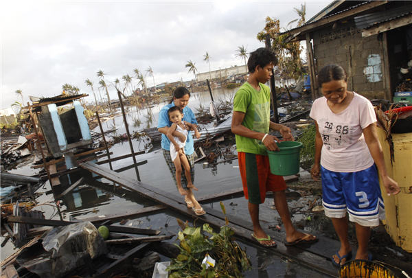 Philippines death toll from Typhoon Haiyan hits 1,833