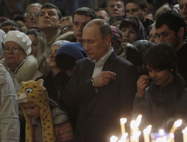 Putin attends Orthodox Christma