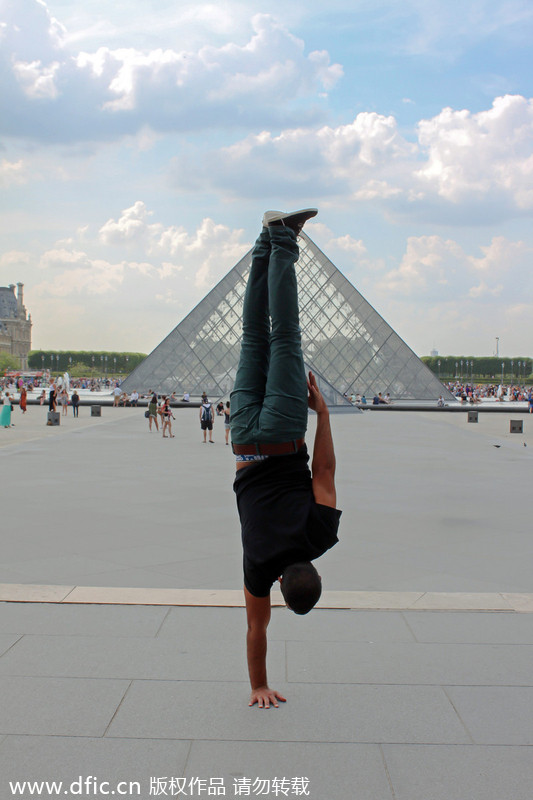 Breakdancer 'freezes' in front of Paris landmarks