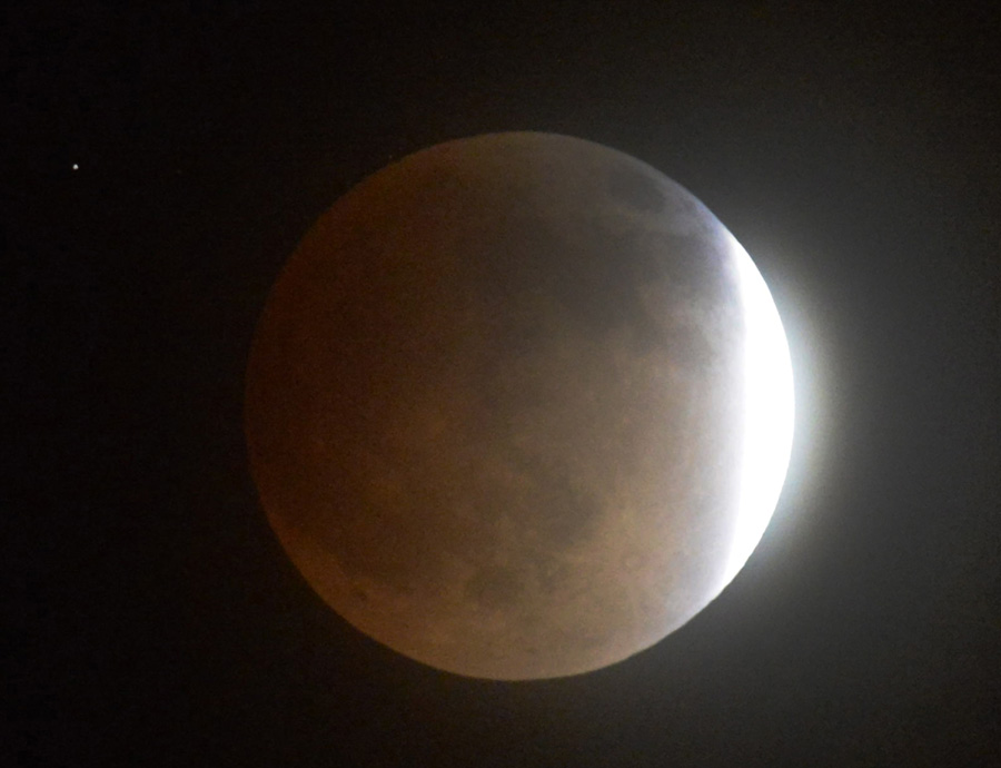 Sky-watchers see 'blood moon' in total lunar eclipse