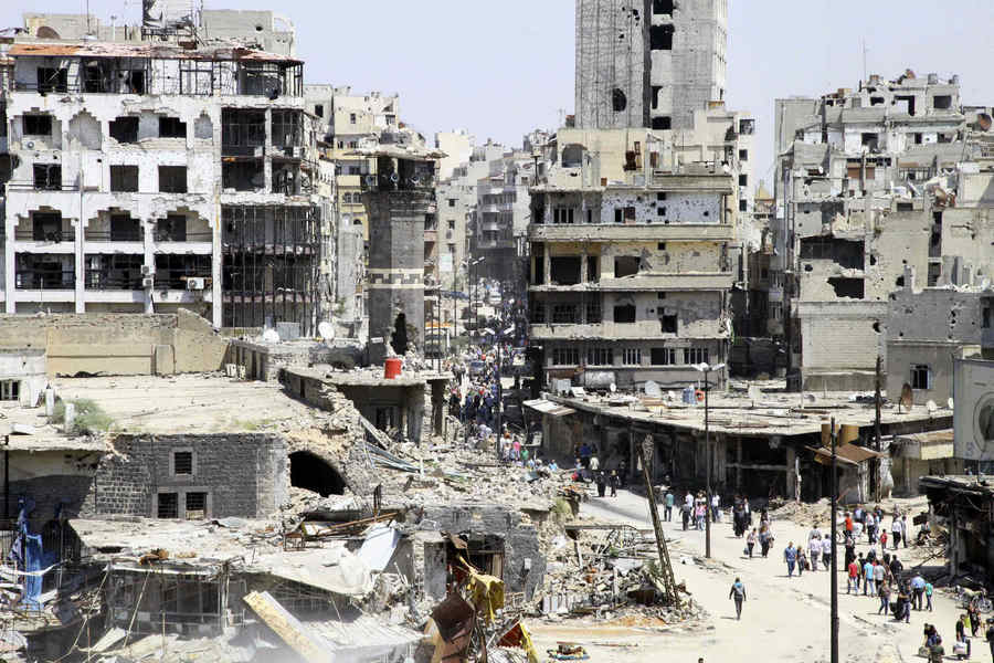 Syrians return to damaged homes