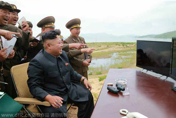 DPRK leader guides test-fire of rocket