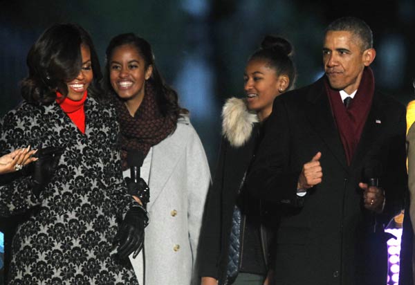 Obamas usher in Christmas with lighting of national tree