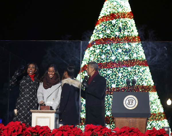 Obamas usher in Christmas with lighting of national tree
