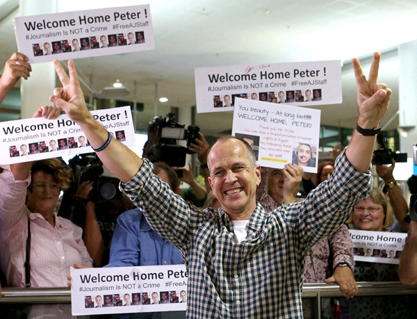 Australian journalist Peter Greste arrives home