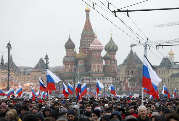 Thousands march in Russia to mourn opposition leader Nemtsov