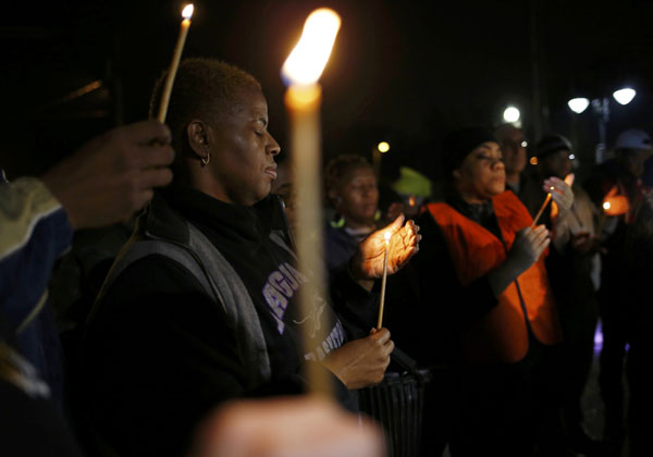 Shooting of Ferguson police officers denounced