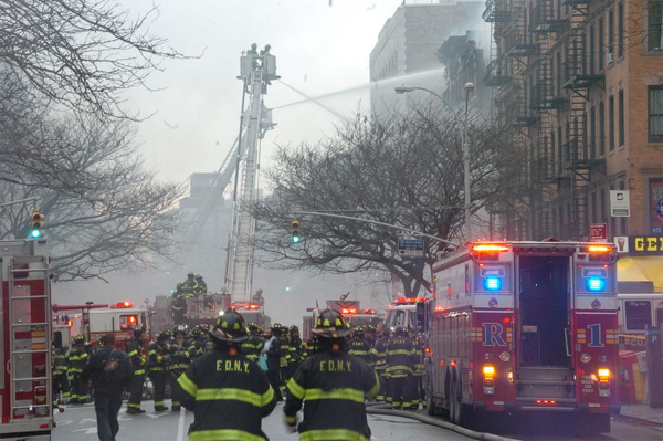 New York fire, building collapse injure 12