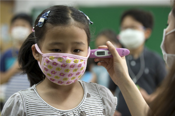 South Korea reports 8 more MERS cases and seventh death
